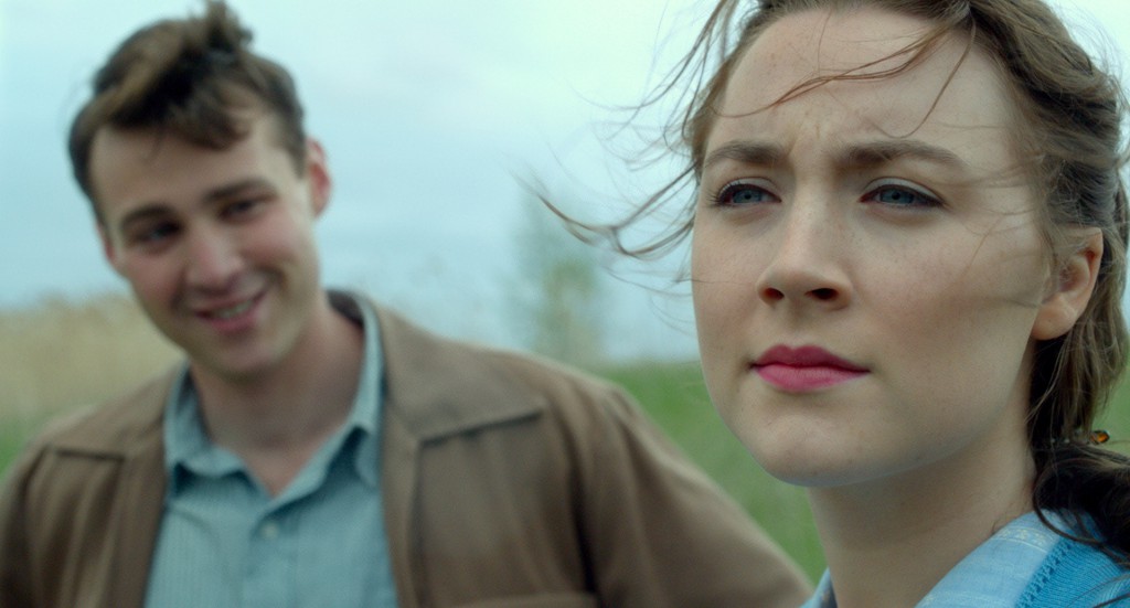 Emory Cohen as "Tony" and Saoirse Ronan as "Eilis" in BROOKLYN. Photo courtesy of Fox Searchlight Pictures. © 2015 Twentieth Century Fox Film Corporation All Rights Reserved